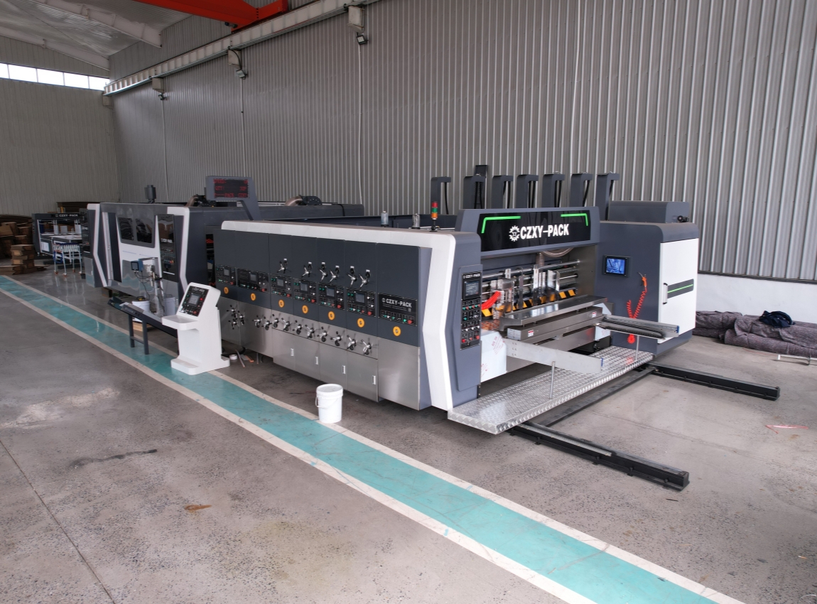 Synchronization of Corrugated Board Formation and Downstream Stacking Synchronization of Corrugated Board Formation and Downstream Stacking
