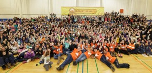 Over 700 volunteers come together to assemble 2000 boxes to feed 10,000 people