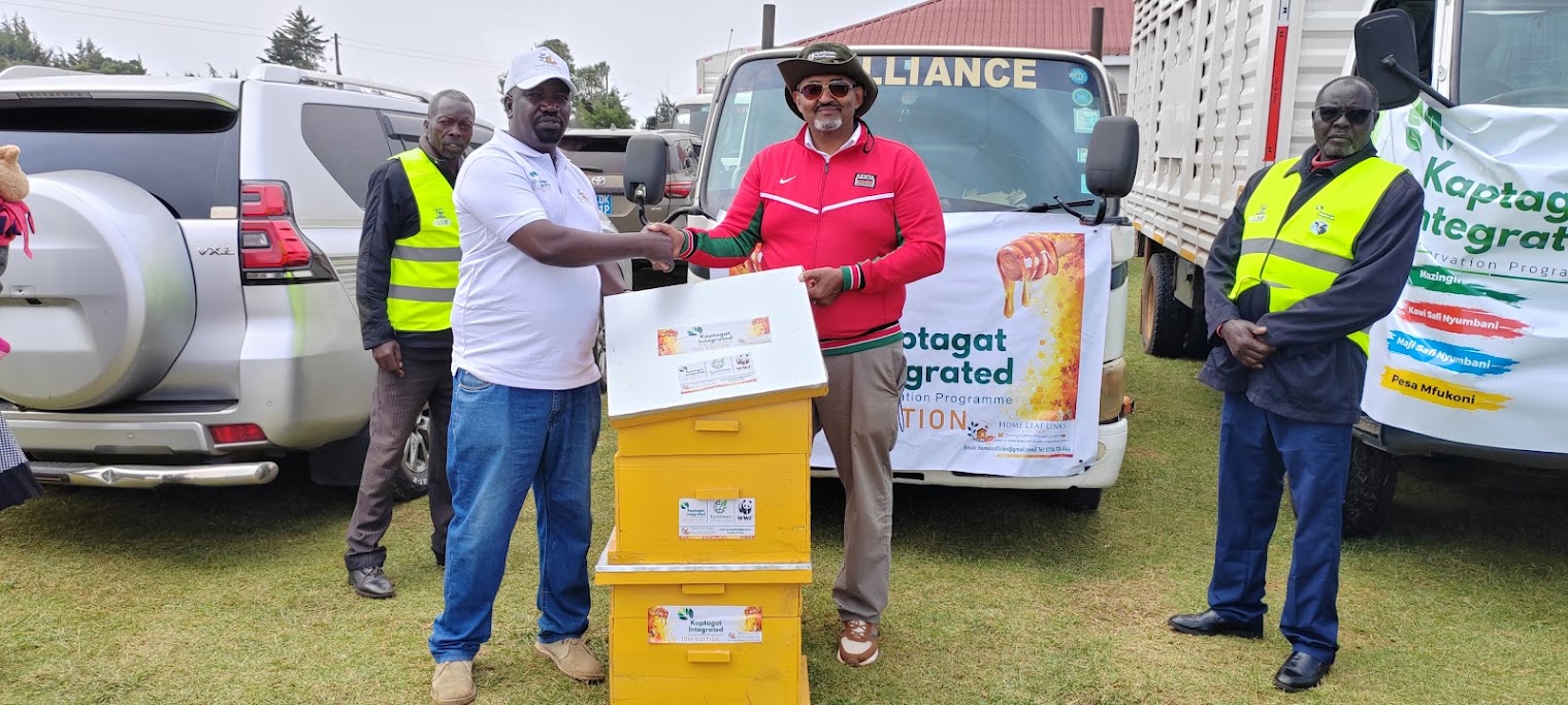 KYoGreen Distributing beedhives to community members as part of its 10K Asali Honey Production Initi