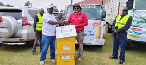 KYoGreen Distributing beedhives to community members as part of its 10K Asali Honey Production Initi