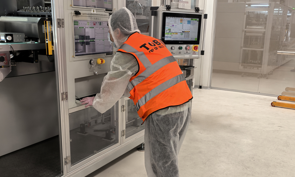 On site service engineers are inspecting the electrode die cutting machine On site service engineers are inspecting the electrode die cutting machine