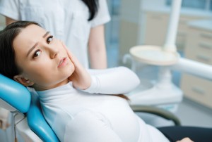 Dental implant queens patient consultation