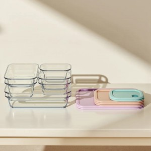 Glass Food Containers And Color Lids Arranged For Compact Storage