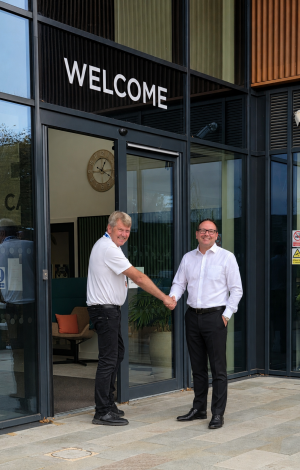 Mark Lait welcomes Chris Scott to AHT s new HQ