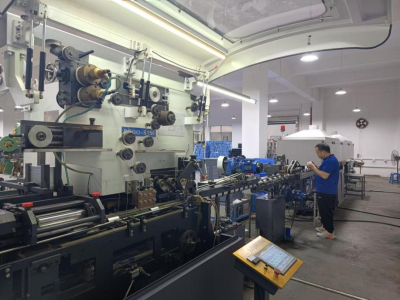 CNC stamping line producing custom metal tins and lids part of JeysTin s in house tea and coffee tin CNC stamping line producing custom metal tins and lids part of JeysTin s in house tea and coffee tin