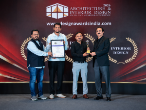 Ceremony photograph — Maulik Shah and Ar. Darshan B. Gala on stage at Taj West End, Bengaluru,