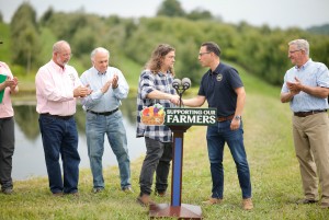 Ben Wenk offers a facilty tour and cider tasting to PA Senator Bob Casey