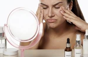woman touching dry skin