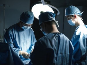 Three Urologists Performing BPH Surgery