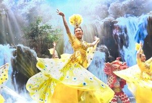 The majestic Golden Peacock and mythical Qilin come to life in a vibrant performance.