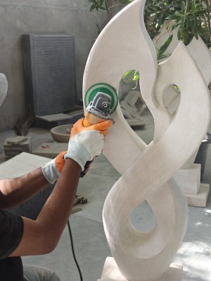 a pair of swan abstract sculpture in making at Stonemart