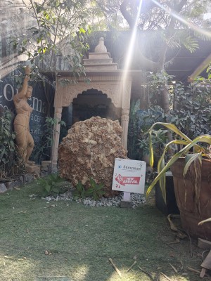 stone gazebo with monolith rock by stonemart