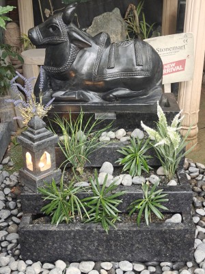 Stonemart Nandi statue with pedestal with plants