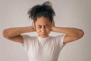 Girl Covering Ears