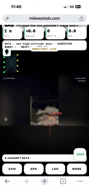 The xHabNET beta playing recorded sky footage, with a HAZARD marker on an unidentified object.