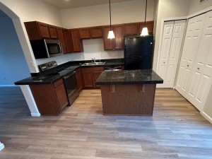 Luxury vinyl plank flooring installation in a Denver Kitchen