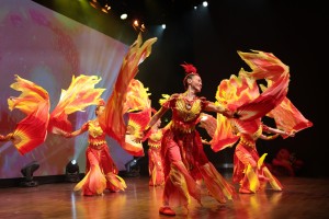 P2-Claire, the Fire Phoenix performer, symbolizes resilience, renewal, peace, and hope.