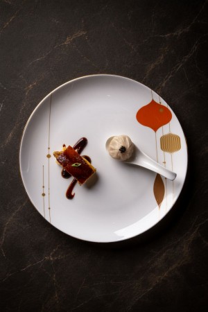 Xiao Long Bao: delicately thin dough pleated around fragrant fillings and umami-filled broth