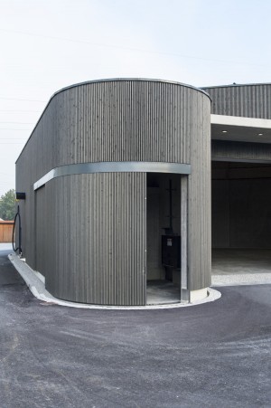 Combining garage Door Aesthetics With Side Sliding Façade Doors