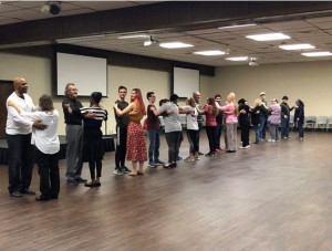 Participants learn the basics of ballroom dancing