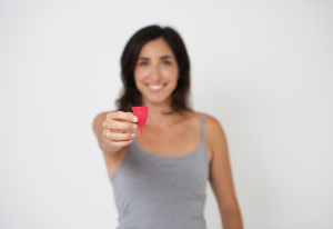 Woman holding a Ruby Cup