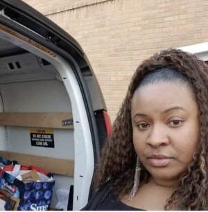Simone Gordon delivering supplies to special needs for Thanksgiving