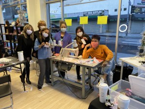 Osyley facemask-building volunteers.