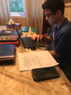 Academy of St Therese student, Ben, 8th Grade, learning from home