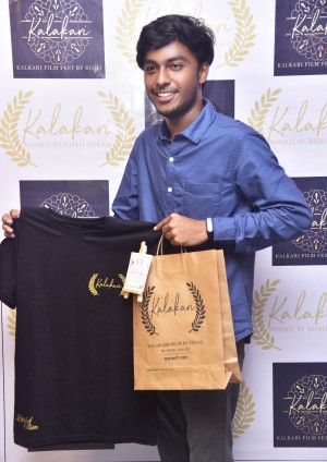 rishi nikam with kalakari merchandise