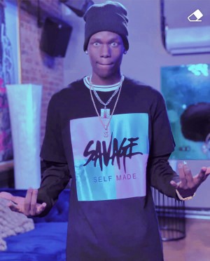 Rapper Kevin Da Savage with epic colorful hairstyle.