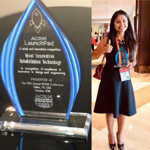 Richa Kohli, CEO, TheraNow, poses with Award for Most Innovative Rehabilitation Technology Company at 2018 ACRM LaunchPad Competition 