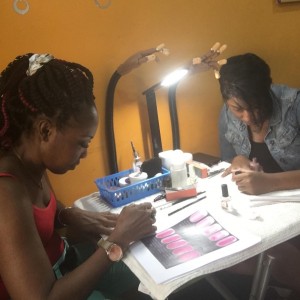 Students practicing on their own hands