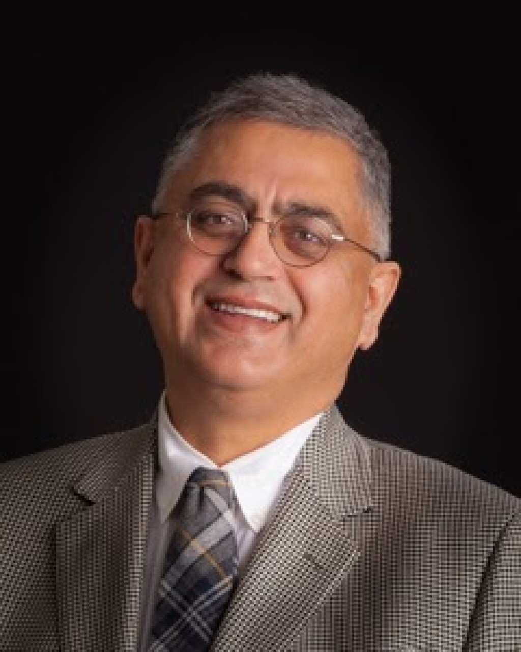 Tarun Sharma, MD, a Gastroenterologist with Kalamazoo Gastroenterology