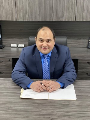 Amr Beltagui, MD, a Psychiatrist with New Dawn TMS Psychiatry 