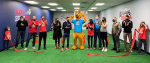 Ribbon cutting at the Grand Opening of the new Amazing Athletes Sports Training Facility.