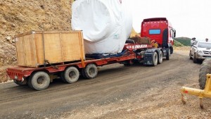 Wind turbine parts being transported on a road improved with RSTs RT20
