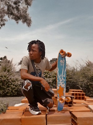 Jade Mario model shot with a Skateboard