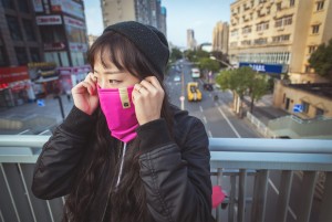 Woman wearing scarf in the city