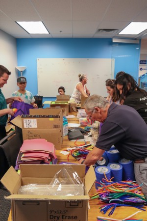 Packing Developmental FX Therapy Kits at the Meritech Office