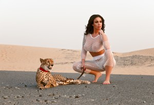 Model Poses with cheetah in Dubai. Photo by Gabriel Radulescu