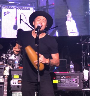 Andy Vargas performing on stage 