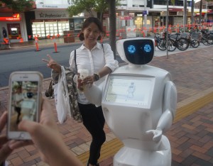 Promobot learning to take selfies with new friend