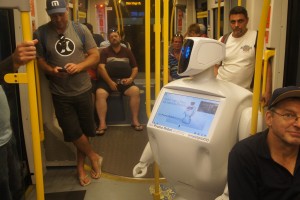 Promobot traveling the G-Link tram onthe Gold Coast