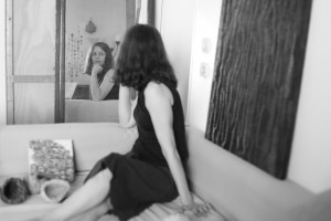 Artist Cécile Bourdais and her artworks.        Photo by May Meng