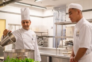 At Sunrice s Chef Instructor guiding our student on using the cook chill technology for food prepara