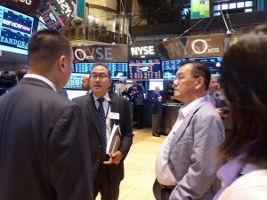 Tan Sri Dr Chin having a discussion with Nasdaq Officials