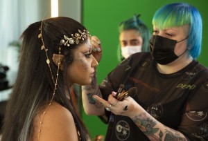 Make-up artist Emily Clayton applying makeup of FAFA