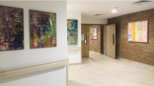 Eugenia Gajardo donates paintings to Assisi Hospice