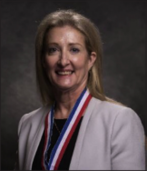 Juanita Villamil-Silvey, DMD, FPFA, FICD,  Dentist