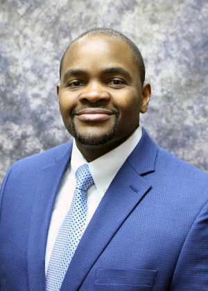 Gilbert-Roy Kamoga, MD, FACP, Internist and Hospitalist with White River Medical Center